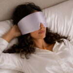 lavender-mist-silk-filled-sleep-mask-on-model.jpg