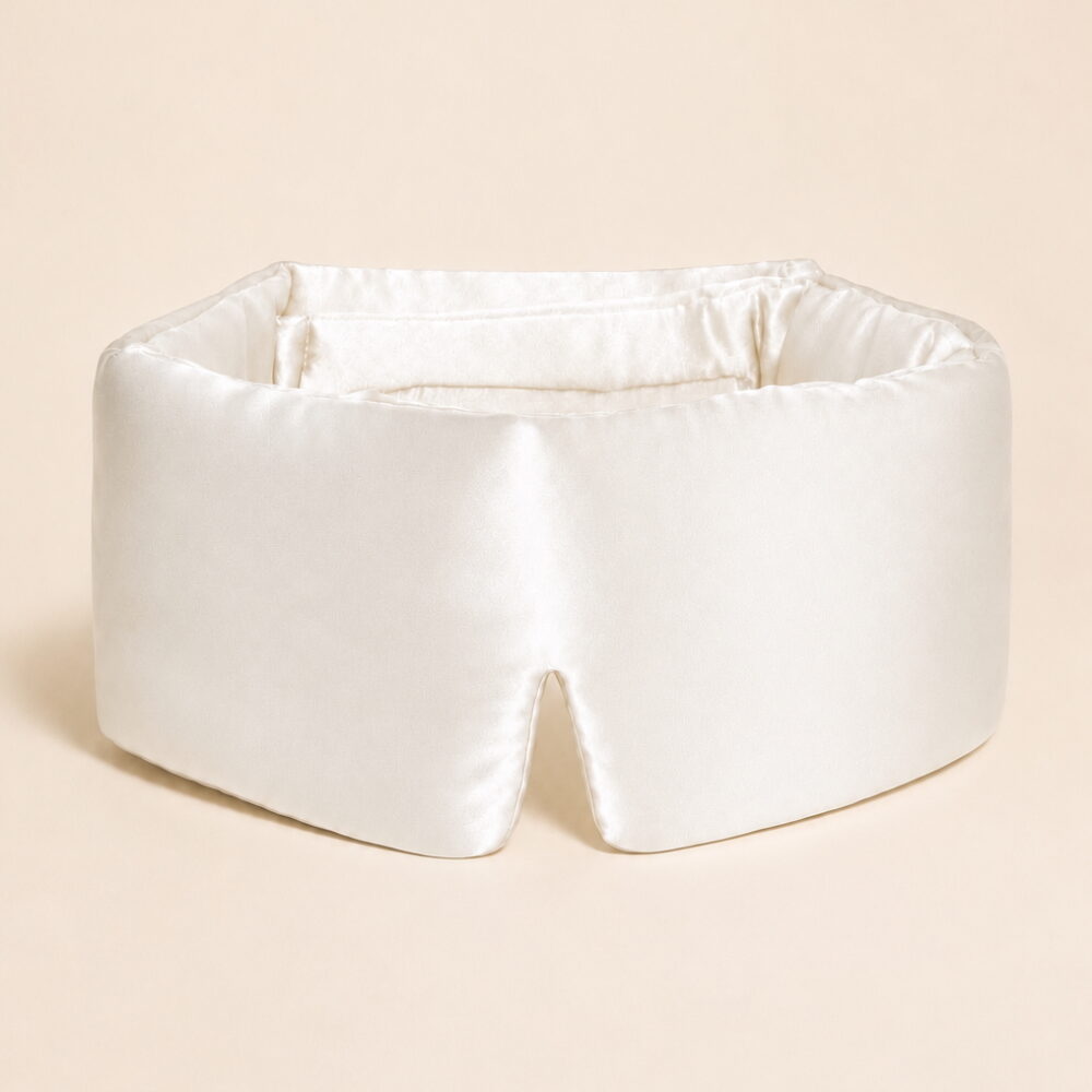 Pearl-white-filled-sleep-mask-on-model.jpg