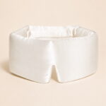 Pearl-white-filled-sleep-mask-on-model.jpg