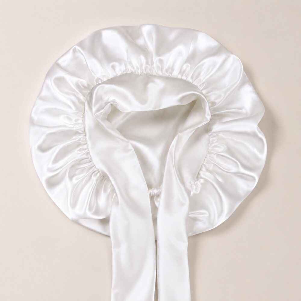 ribbon-tie-bonnet-pearl-white-flat-lay