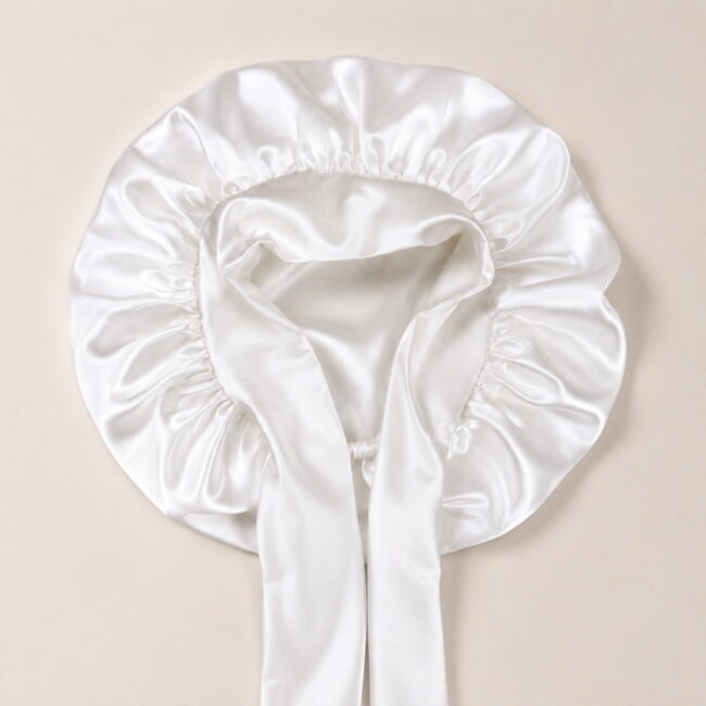 ribbon-tie-bonnet-pearl-white-flat-lay