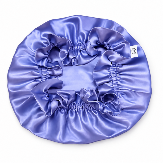 Periwinkle blue silk bonnet on a white background