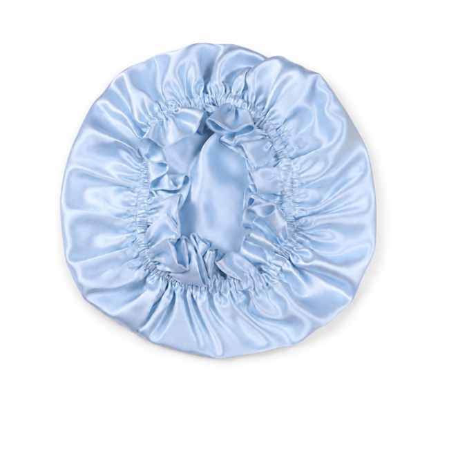 Sky blue silk bonnet on a white background